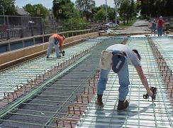 Construction site where reinforced steel is fixed with an automatic rebar tier